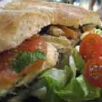 traditional cyprus sandwich with halloumi, onions and tomato 